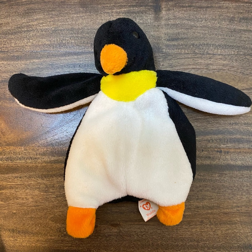 TY Beanie Babies Waddle retired collectible penguin  7” tall PVC pellets no tag